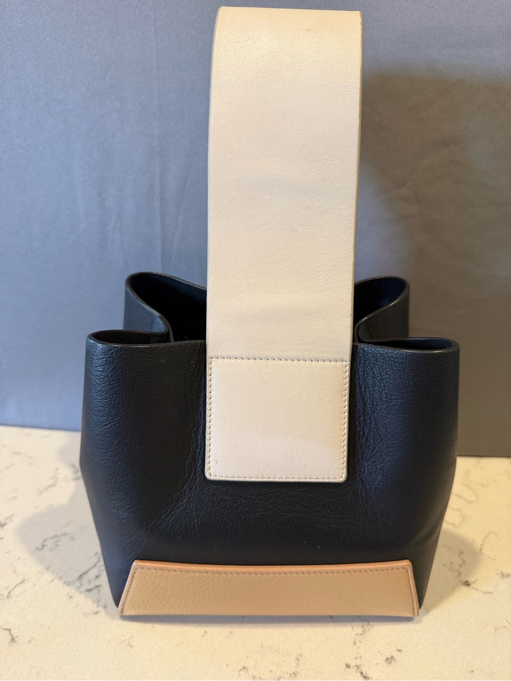 Yuzefi Black Shoulder Bag with Cream Strap and Tan Base Accent